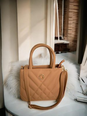 BOLSA PEQUENA MAO COURO COR MARROM / P DJAQUE